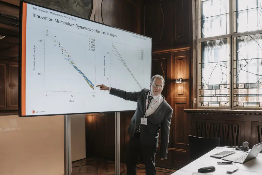 Speaker presenting a patent intelligence chart at the Innovation Forum 2026
