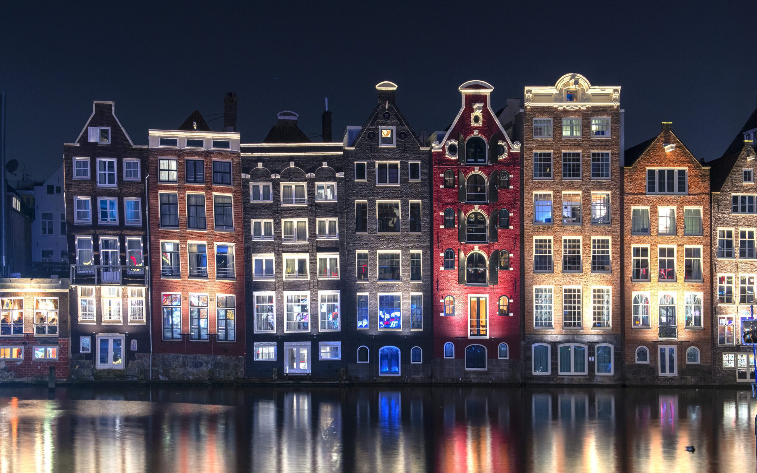 Typical Amsterdam houses with reflection in the water