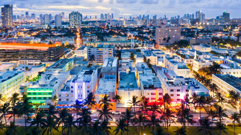Aerial of Ocean drive and Miami downtown at dusk, Florida